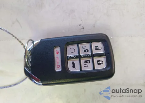 2024 Honda Odyssey Touring z USA, uszkodzony, nr VIN 5FNRL6H85RB034493